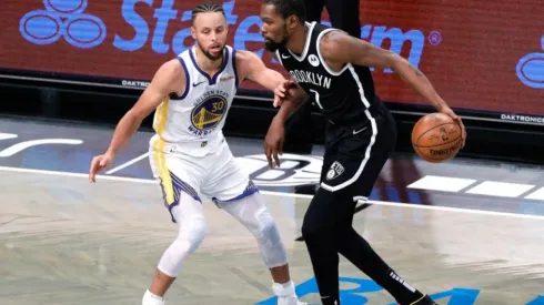 Steph Curry of Warriors (left) and Kevin Durant of Nets