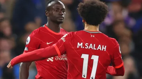 Sadio Mane of Liverpool celebrates after scoring a goal with his team mate Mohamed Salah