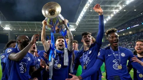Christian Pulisic of Chelsea lifts the UEFA Champions League Trophy