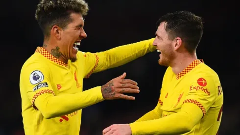 Roberto Firmino and Andy Robertson of Liverpool