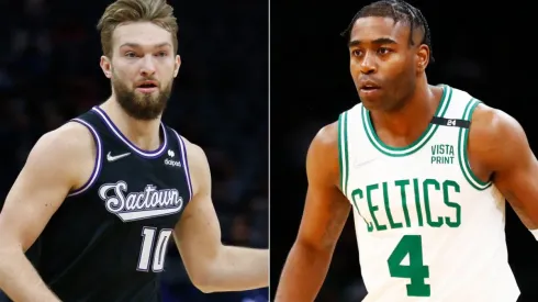 Domantas Sabonis of the Sacramento Kings and Kelan Martin of the Boston Celtics