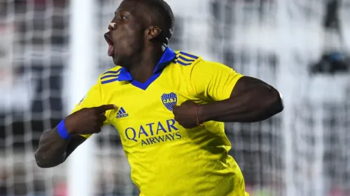 Boca Juniors are playing against River Plate with a yellow jersey.