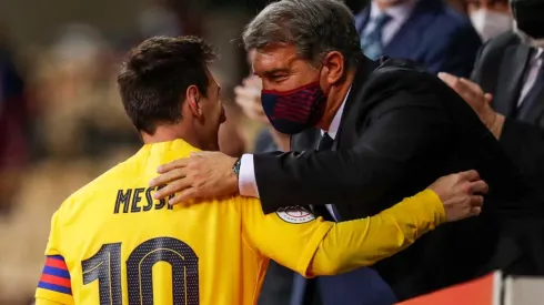 Lionel Messi and Joan Laporta of Barcelona