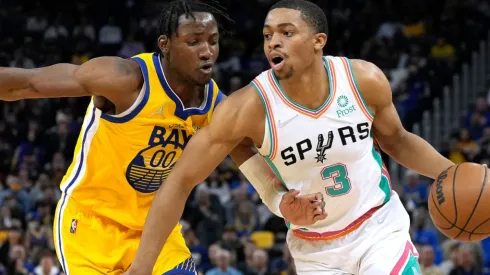 Jonathan Kuminga of the Golden State Warriors and Keldon Johnson of the San Antonio Spurs