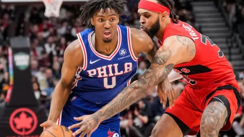 Tyrese Maxey of the Philadelphia 76ers drives against Gary Trent Jr. of the Toronto Raptors