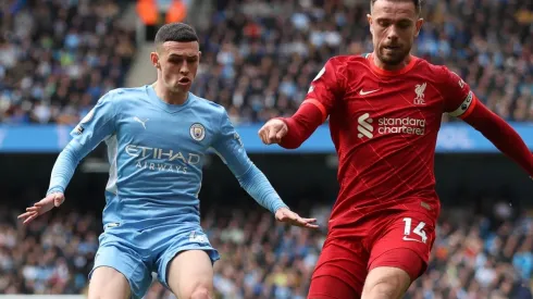 Phil Foden of Manchester City and Jordan Henderson of Liverpool