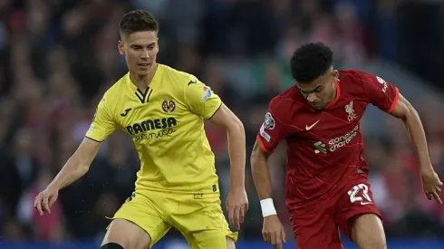 Luis Diaz of Liverpool disputes the ball with Juan Foyth of Villarreal