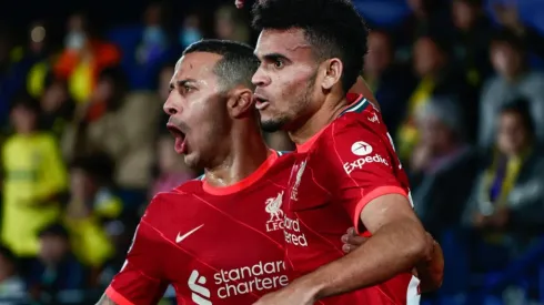 Luis Diaz of Liverpool FC celebrates a goal with Thiago