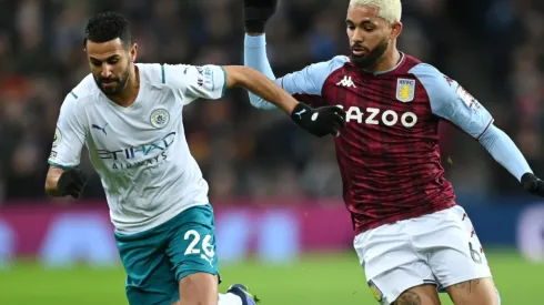 Riyad Mahrez of Manchester City and Douglas Luiz of Aston Villa