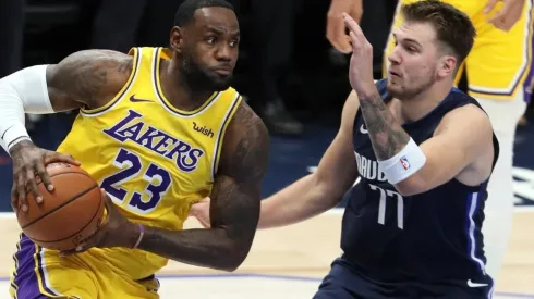 Luka Doncic guarding LeBron James