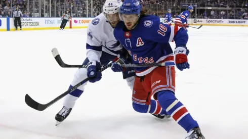 Jan Rutta #44 of the Tampa Bay Lightning slows down Artemi Panarin #10 of the New York Rangers in Game One of the Eastern Conference Final of the 2022 Stanley Cup Playoffs at Madison Square Garden on June 01, 2022 in New York City.
