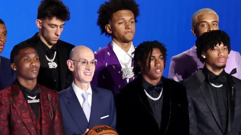 NBA commissioner Adam Silver (C) with the 2022 NBA Draft class