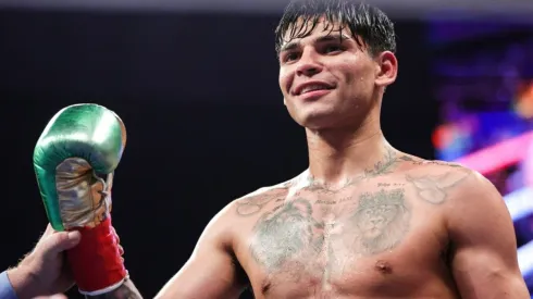 Ryan Garcia celebrates defeating Emmanuel Tagoe