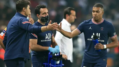 Mauricio Pochettino (left) and Kylian Mbappe.