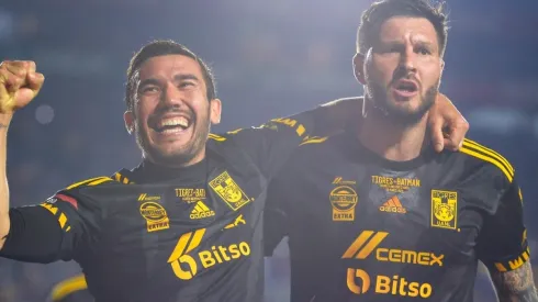 Juan Vigon with André-Pierre Gignac of Tigres UANL