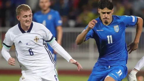 Shayne Lavery of Northern Ireland and Donat Rrudhani of Kosovo