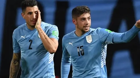 Federico Valverde with Jose Maria Gimenez of Uruguay