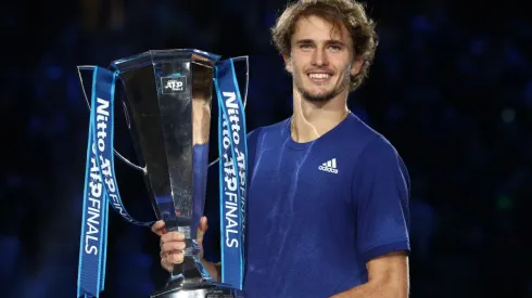 Alexander Zverev of Germany celebrates with the trophy of the 2021 ATP Finals