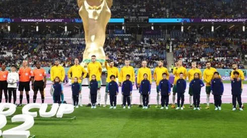 Australian players stand for the national anthem
