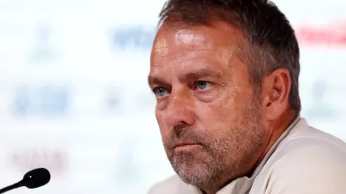 Hansi Flick, Head Coach of Germany, speaks during the Germany Press Conference at the Main Media Center on November 30, 2022 in Doha, Qatar.