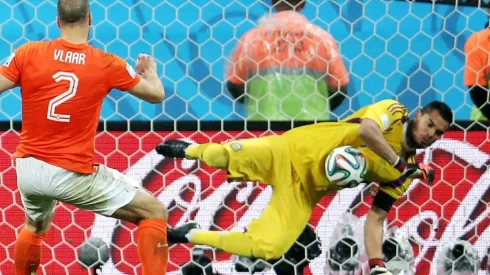 Sergio Romero of Argentina saves the penalty kick of Ron Vlaar of the Netherlands at the 2014 FIFA World Cup