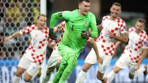 Dominik Livakovic of Croatia celebrates the win via a penalty shootout