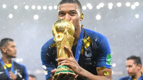 Kylian Mbappe of France with the FIFA World Cup trophy