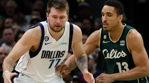 Luka Doncic of the Dallas Mavericks and Malcolm Brogdon of the Boston Celtics