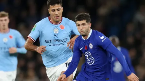 Rodri of Manchester City and Christian Pulisic of Chelsea