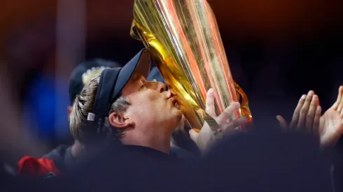 HC Kirby Smart of the Bulldogs kissing his second back-to-back CFP title