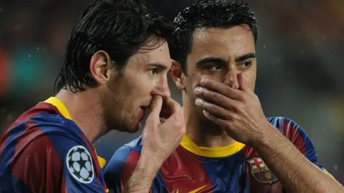 Lionel Messi and Xavi Hernandez