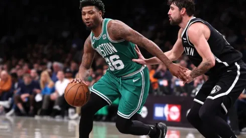 Marcus Smart #36 of the Boston Celtics drives against Joe Harris #12 of the Brooklyn Nets