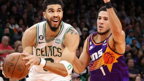 Jayson Tatum of the Boston Celtics and Devin Booker of the Phoenix Suns