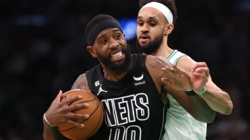 Royce O'Neale of the Brooklyn Nets and Derrick White of the Boston Celtics