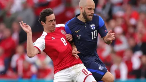 Thomas Delaney of Denmark and Teemu Pukki of Finland