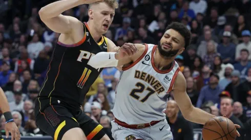 Jamal Murray of the Denver Nuggets and Jock Landale of the Phoenix Suns