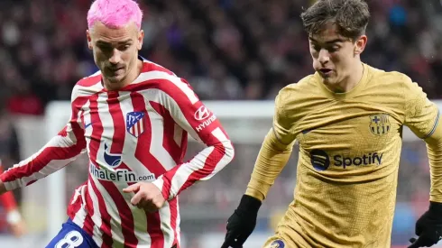 Antoine Griezmann of Atletico Madrid and Gavi of Barcelona