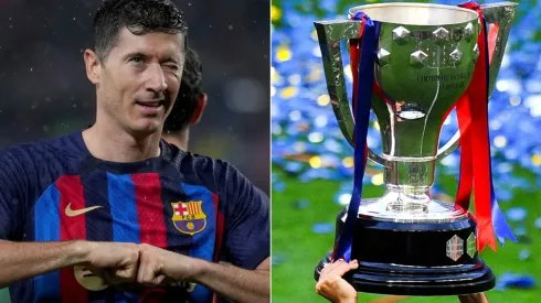 Robert Lewandowski of Barcelona and La Liga trophy