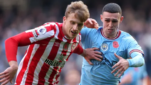 Mads Roerslev of Brentford and Phil Foden of Manchester City