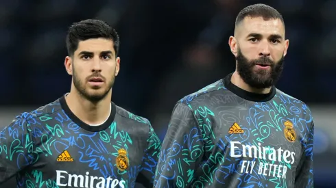Marco Asensio and Karim Benzema of Real Madrid