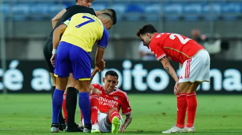 Cristiano Ronaldo of Al Nassr helps former teammate Angel Di Maria of SL Benfica
