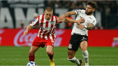 Santiago Ascacibar of Estudiantes fights for the ball with Yuri Alberto of Corinthians