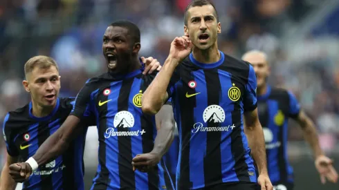 Henrikh Mkhitaryan of FC Internazionale celebrates with his team-mate Marcus Thuram