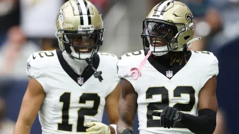 Rashid Shaheed #22 of the New Orleans Saints celebrates with Chris Olave