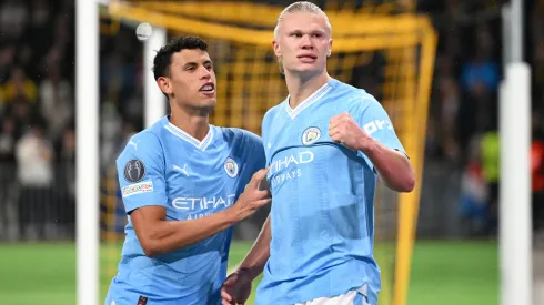 Erling Haaland of Manchester City celebrates with teammate Matheus Nunes
