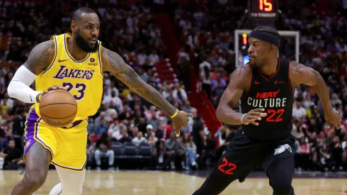LeBron James drives against Jimmy Butler