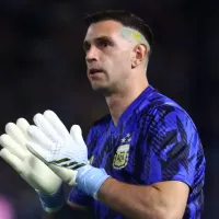 Dibu Martinez tries to stop Brazilian police from hitting Argentina fans