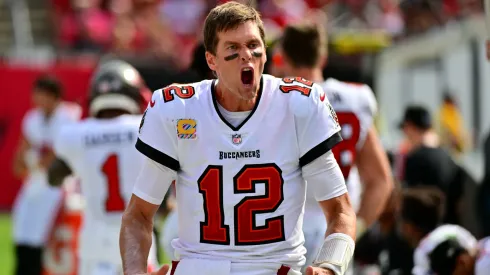 Tom Brady celebrating after scoring a touchdown.