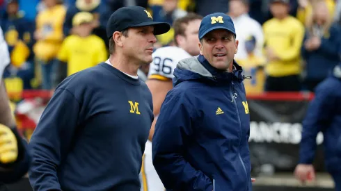 John and Jim Harbaugh during a game of the Michigan Wolverines in 2015