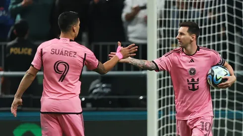 Lionel Messi of Inter Miami celebrates scoring his team's second goal from the penalty spot with teammate Luis Suarez after during the Riyadh Season Cup match between Al Hilal and Inter Miami at Kingdom Arena on January 29, 2024 in Riyadh, Saudi Arabia.